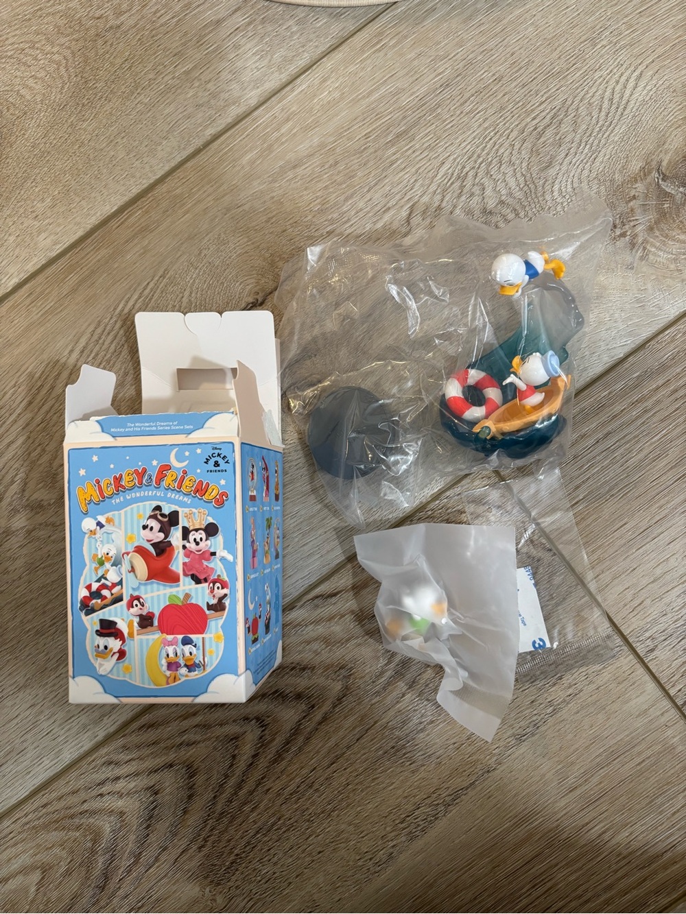 POPMART Disney Donald Duck Mini Figure with Teal Boat and Red-White Life Ring